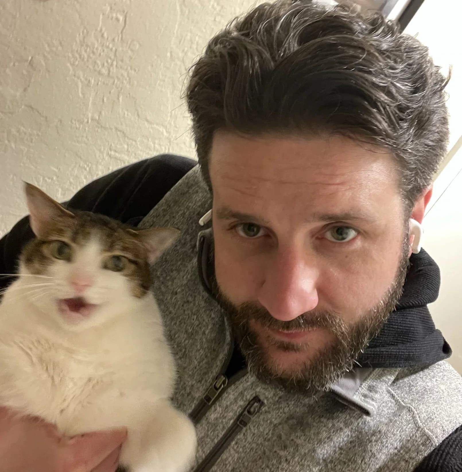 Doug Rogers with his cat Lola